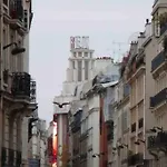 Charming Parisian Apartment Under The Rooftops