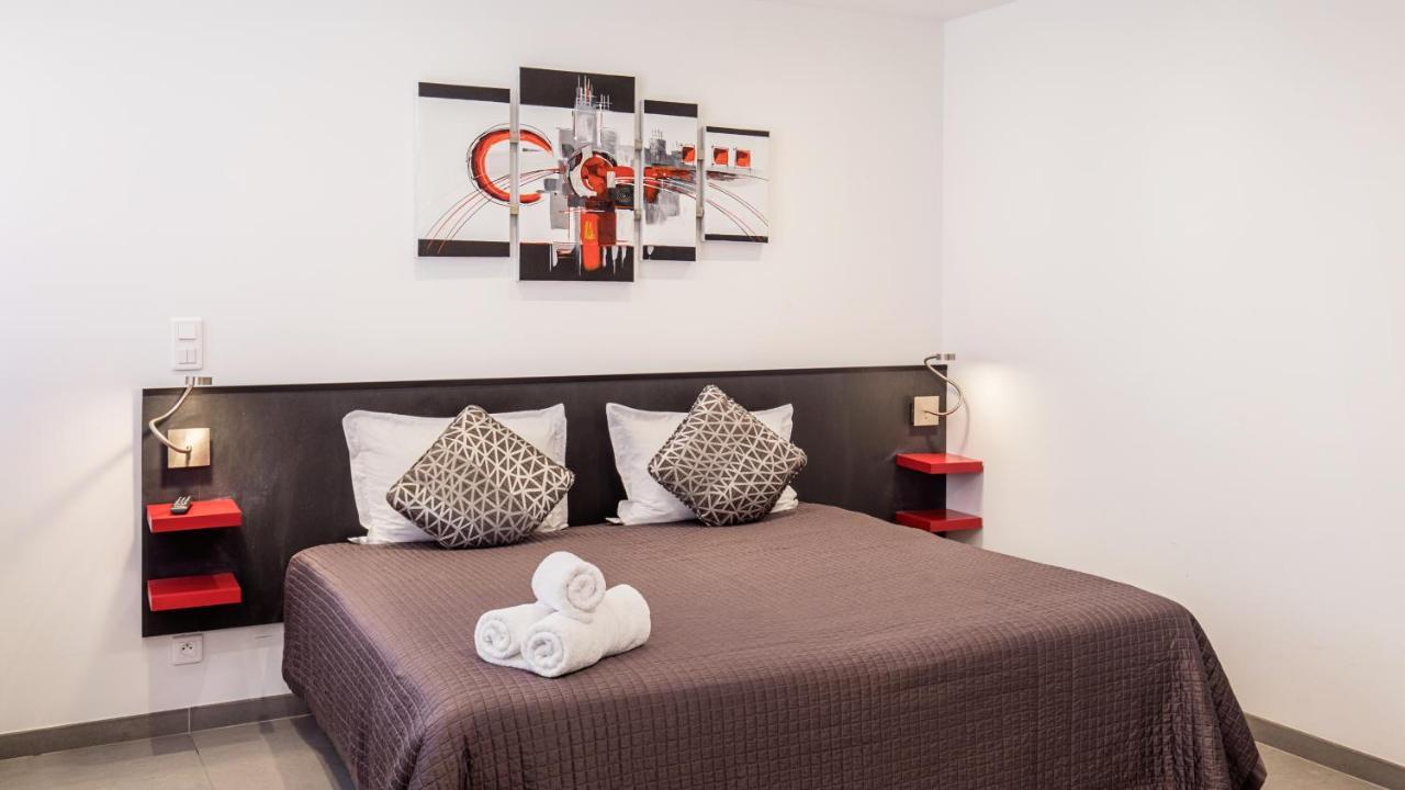 De L'horloge Appart hôtel 2*