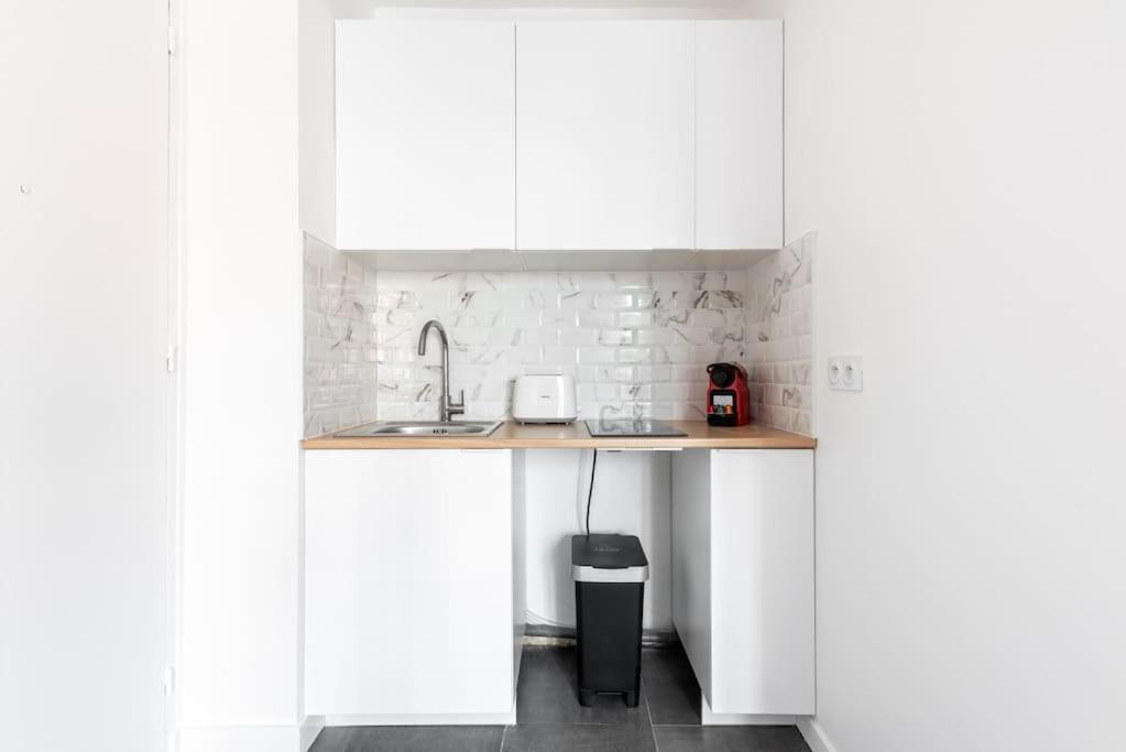 Appartement Lumineux Est - Serurier Paris