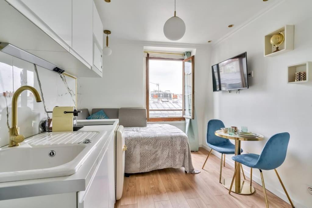 Appartement Studio Sur Les Toits Parisiens *