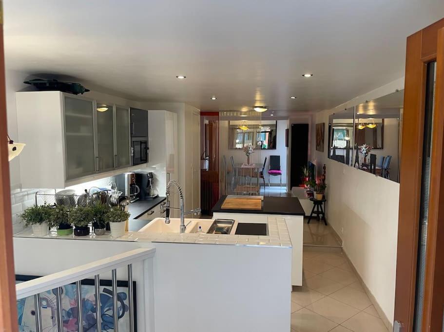 Chezadrienparis - De 90m2 En Souplex Paris