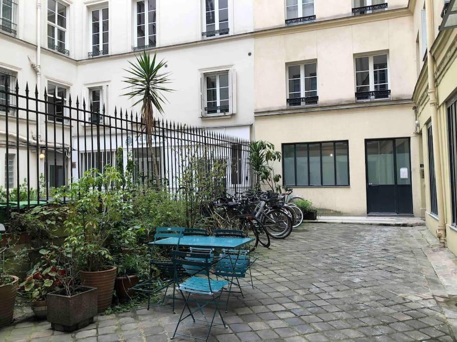 Charming Parisian Under The Rooftops